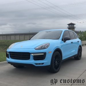 Porsche Cayenne wrapped in 3M 1080 Gloss Sky Blue vinyl
