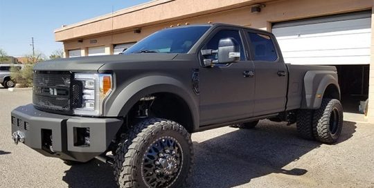 Ford F450 wrapped in 3M Matrix Black vinyl