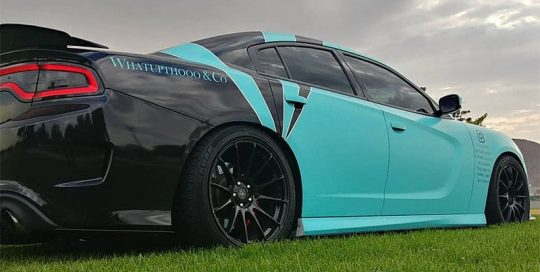 Dodge Charger wrapped in 3M Satin Key West and Gloss Black vinyls