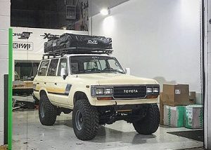 Toyota Landcruiser wrapped in Orafol 970RA Gloss Taxi Beige vinyl
