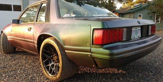 Ford Mustang wrapped in Avery Satin Urban Jungle Silver/Green/Purple shade shifting vinyl