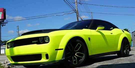 Dodge Challenger wrapped in 3M Satin Neon Fluorescent Yellow vinyl