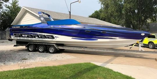 Boat wrapped in custom printed Avery 1105ezrs and 1360Z Gloss Laminate