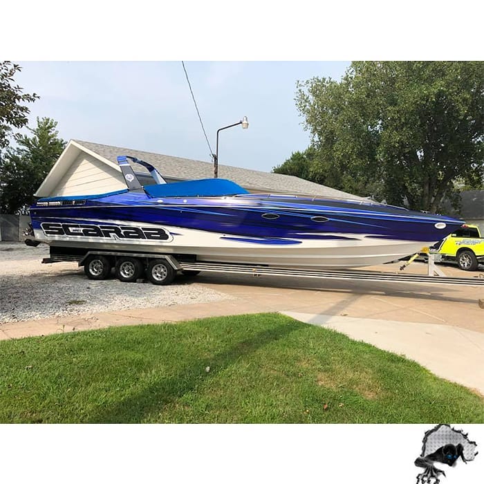 Boat wrapped in custom printed Avery 1105ezrs and 1360Z Gloss Laminate