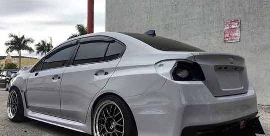 Subaru STI wrapped in Avery SW Gloss Grey vinyl