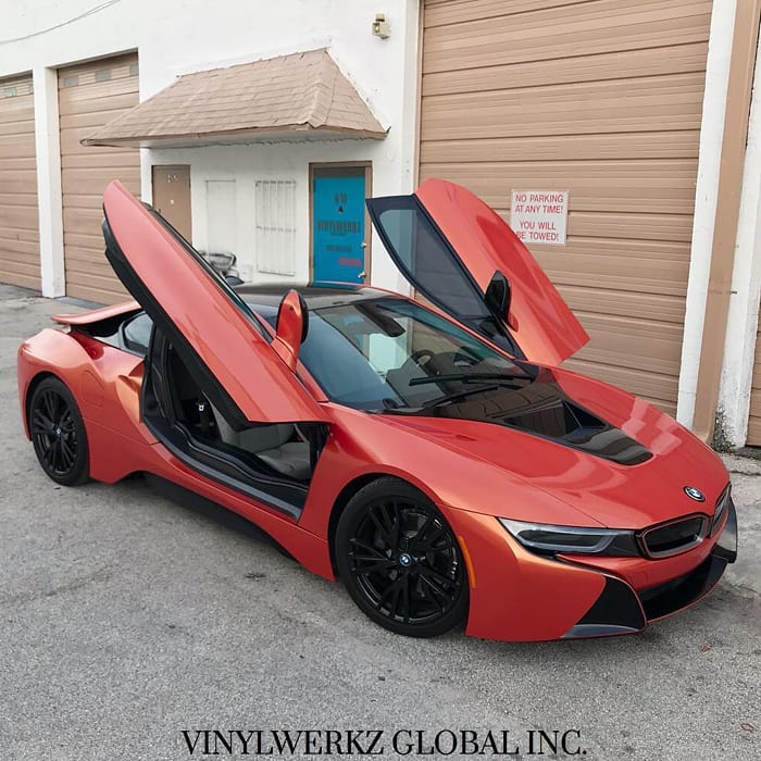 Bmw I8 wrapped in Orafol Shift Effect Gloss Sunset Shift Red/Orange shade shifting vinyl