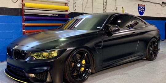 Bmw M4 wrapped in Avery SW Satin Black vinyl