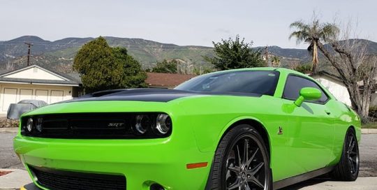 Dodge Challenger wrapped in Avery SW Gloss Grass Green vinyl