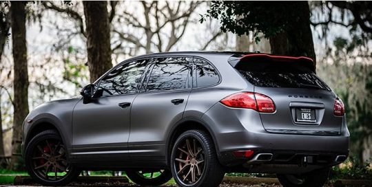 Porsche Cayenne wrapped in 3M 1080 Satin Dark Gray vinyl