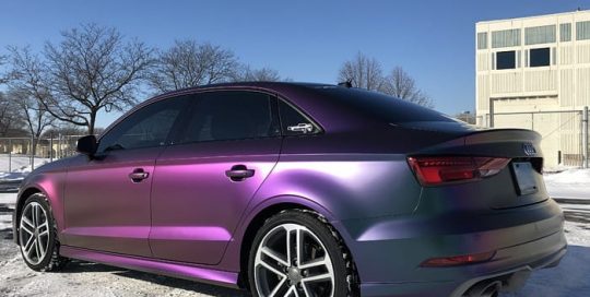 Audi A3 wrapped in Avery ColorFlow Satin Lightning Ridge Green/Purple shade shifting vinyl