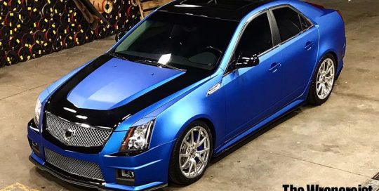 Cadillac CTS wrapped in 3M 1080 Matte Blue Metallic & Gloss Black