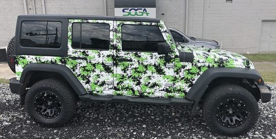 Jeep Wrangler wrapped in custom printed Avery 1105 &1360z Gloss laminate