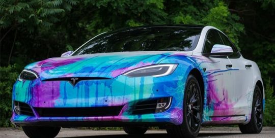Tesla wrapped in custom printed Avery SW White Diamond vinyl