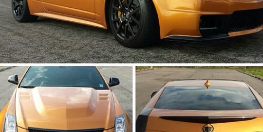 Cadillac CTS wrapped in Arlon 2300X Citrine Candy