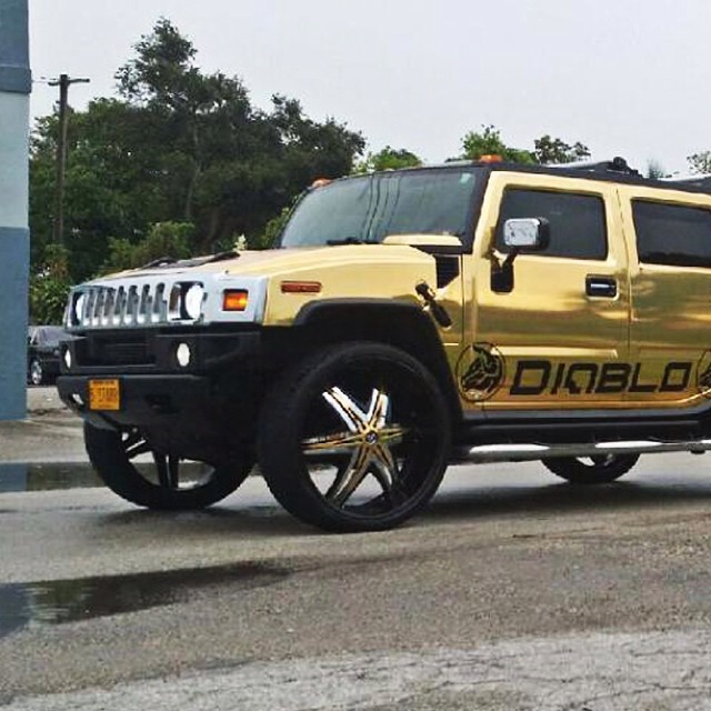 Hummer wrapped in Avery Gold Chrome