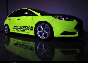 Ford Focus wrapped in Hi Liter (fluorescent) Yellow vinyl