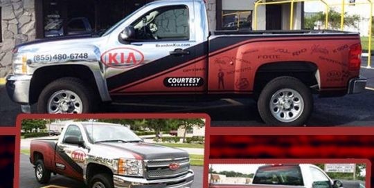 Kia wrapped in Red Aluminum vinyl combined with Avery Chrome and 1080 Satin Black