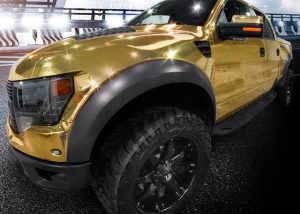 Ford Raptor Svt wrapped in Avery gold chrome vinyl!