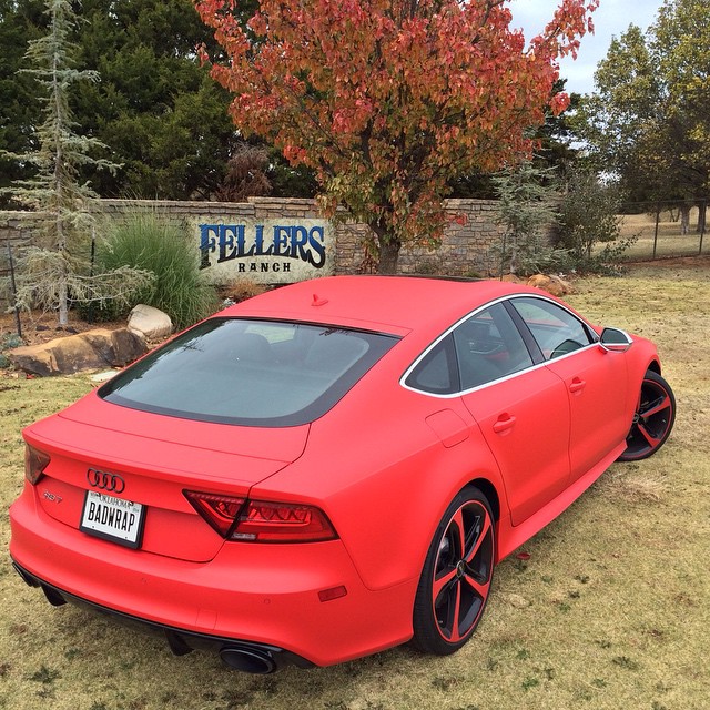 Audi RS7 wrapped in UPP F1 Matte Racing Red vinyl