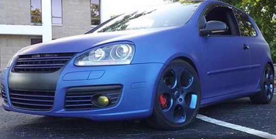 Volkswagen Golf Gti wrapped in Avery SWMatte Metallic Blue vinyl