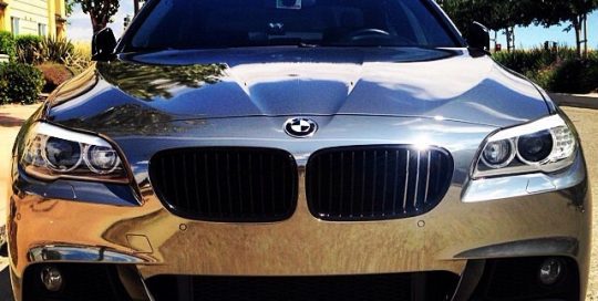 Bmw 350i wrapped in Avery Conform Black Chrome vinyl