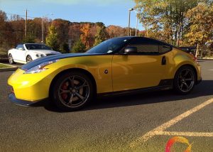 Nissan 370z wrapped in 1080 Lemon Sting vinyl