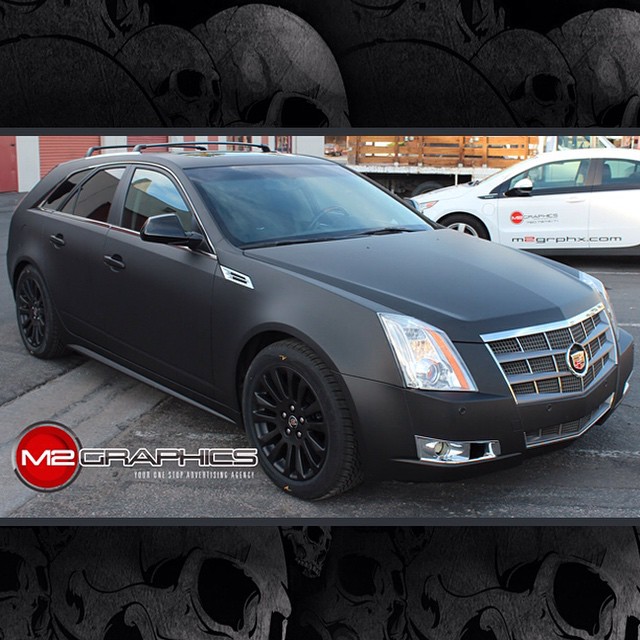 Cadillac CTS wrapped in Avery Matte Black