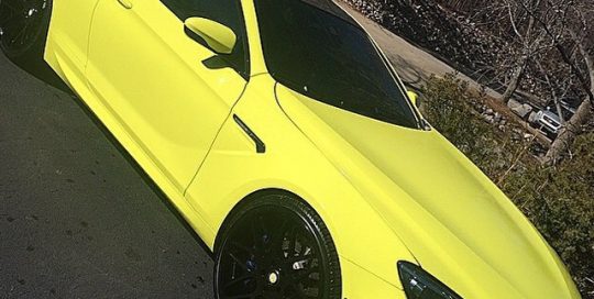 Bmw M6 wrapped in Avery Gloss Ambulance Yellow vinyl