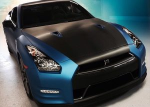 Nissan GTR wrapped in Blue Aluminum Avery Black Carbon Fiber vinyl