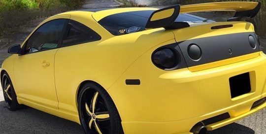Chevrolet Cobalt wrapped in Matte Yellow and Matte Black