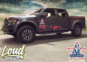 Ford Raptor wrapped in Matte Black vinyl and custom printing on IJ 480Cv3