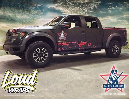 Ford Raptor wrapped in Matte Black vinyl and custom printing on IJ 480Cv3