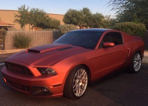 Ford Mustang GT wrapped in Red Aluminum