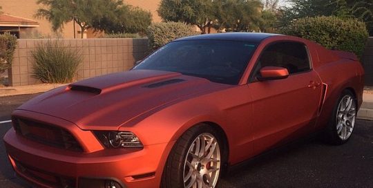 Ford Mustang GT wrapped in Red Aluminum