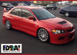Mitsubishi Evolution wrapped in Avery Gloss Carmine Red