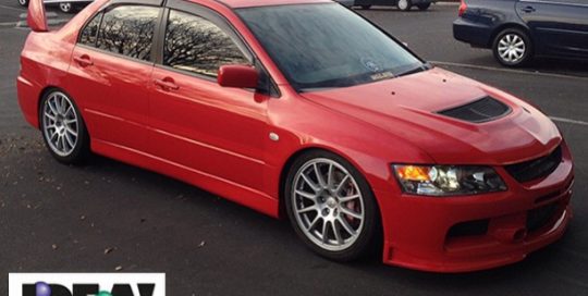 Mitsubishi Evolution wrapped in Avery Gloss Carmine Red