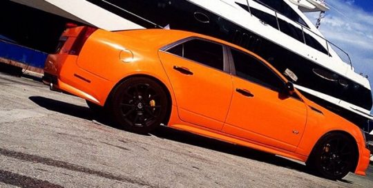 Cadillac CTVS wrapped in 970RA Municipal Orange vinyl