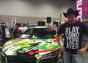 Audi R8 wrapped in custom printed paint splatter effect