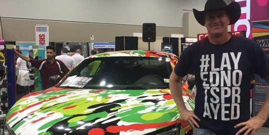 Audi R8 wrapped in custom printed paint splatter effect
