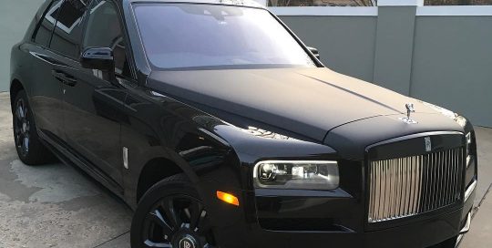 Rolls Royce Ghost wrapped in Gloss Black vinyl and hood wrapped in CheetahWrap Matte Black vinyl