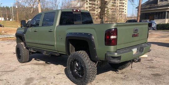 GMC Sierra wrapped in Matte Military Green vinyl