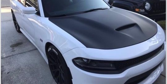 Dodge Charger wrapped in Matte Black vinyl