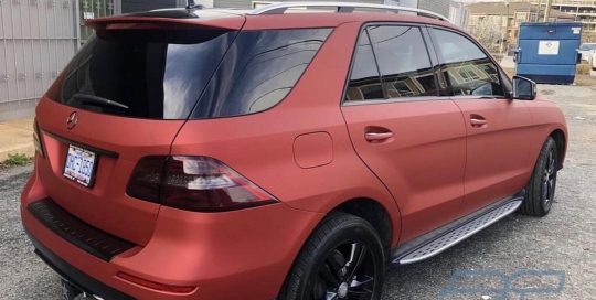 Mercedes Benz wrapped in Satin Red Aluminum vinyl