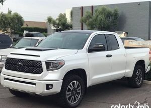 Toyota Tundra wrapped in 3M 1080 Satin Pearl White and Satin Black vinyls