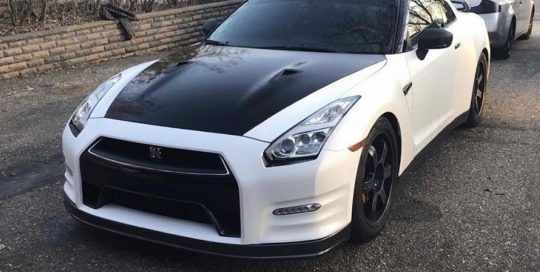 Nissan GTR wrapped in Satin White and Gloss Black vinyls
