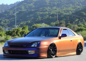 Honda Prelude wrapped in Avery ColorFlow Satin Roaring Thunder Blue/Red shade shifting vinyl