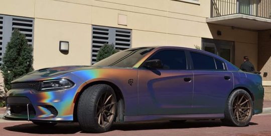 Dodge Charger wrapped in 3M Gloss Flip Psychedelic vinyl