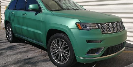 Jeep wrapped in Avery SW Matte Emerald Green Metallic vinyl
