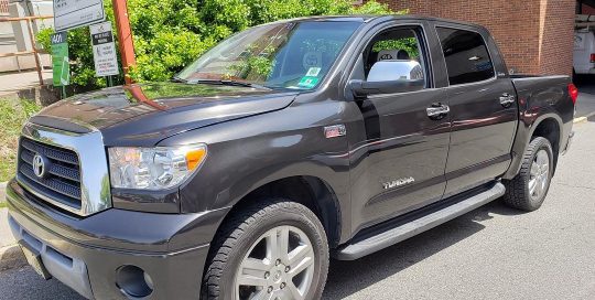 Toyota Tundra wrapped in Gloss Black Metallic vinyl