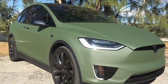 Tesla wrapped in Matte Military Green vinyl